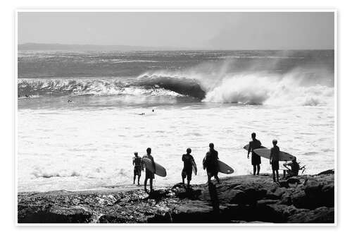 Surfers are waiting on the beach